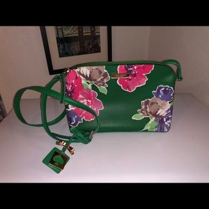 Green and hot pink floral print purse.